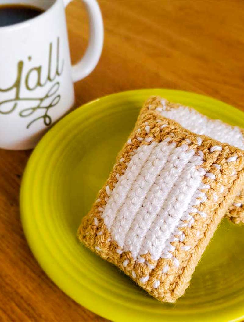 crochet beignet and cup of coffee