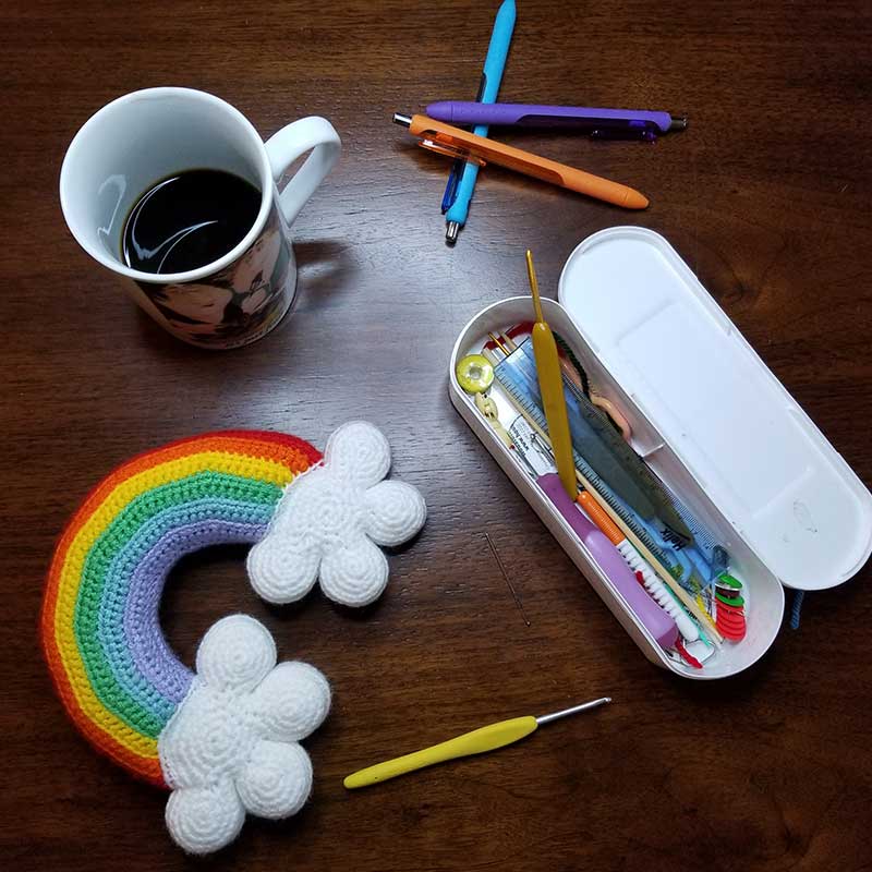 crochet rainbow pens and coffee