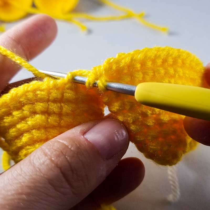 hand crocheting star points together