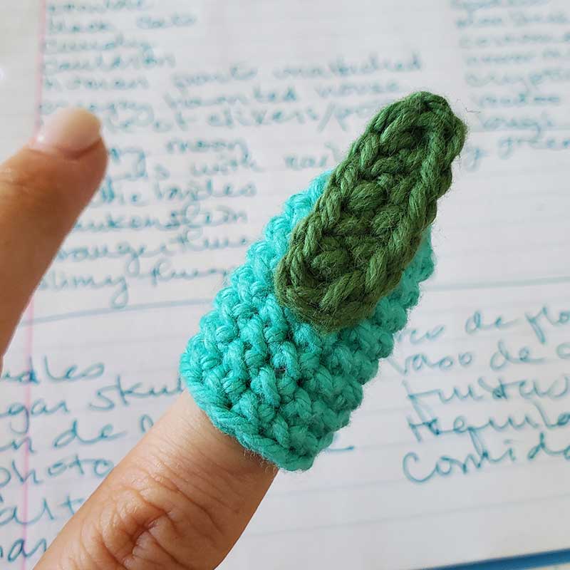 finger wearing witch crochet fingertip 