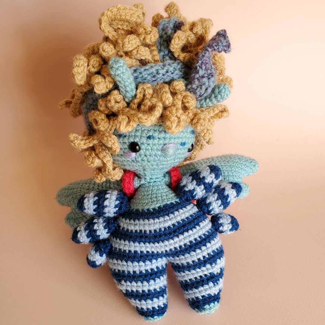 Blue crocheted crab doll