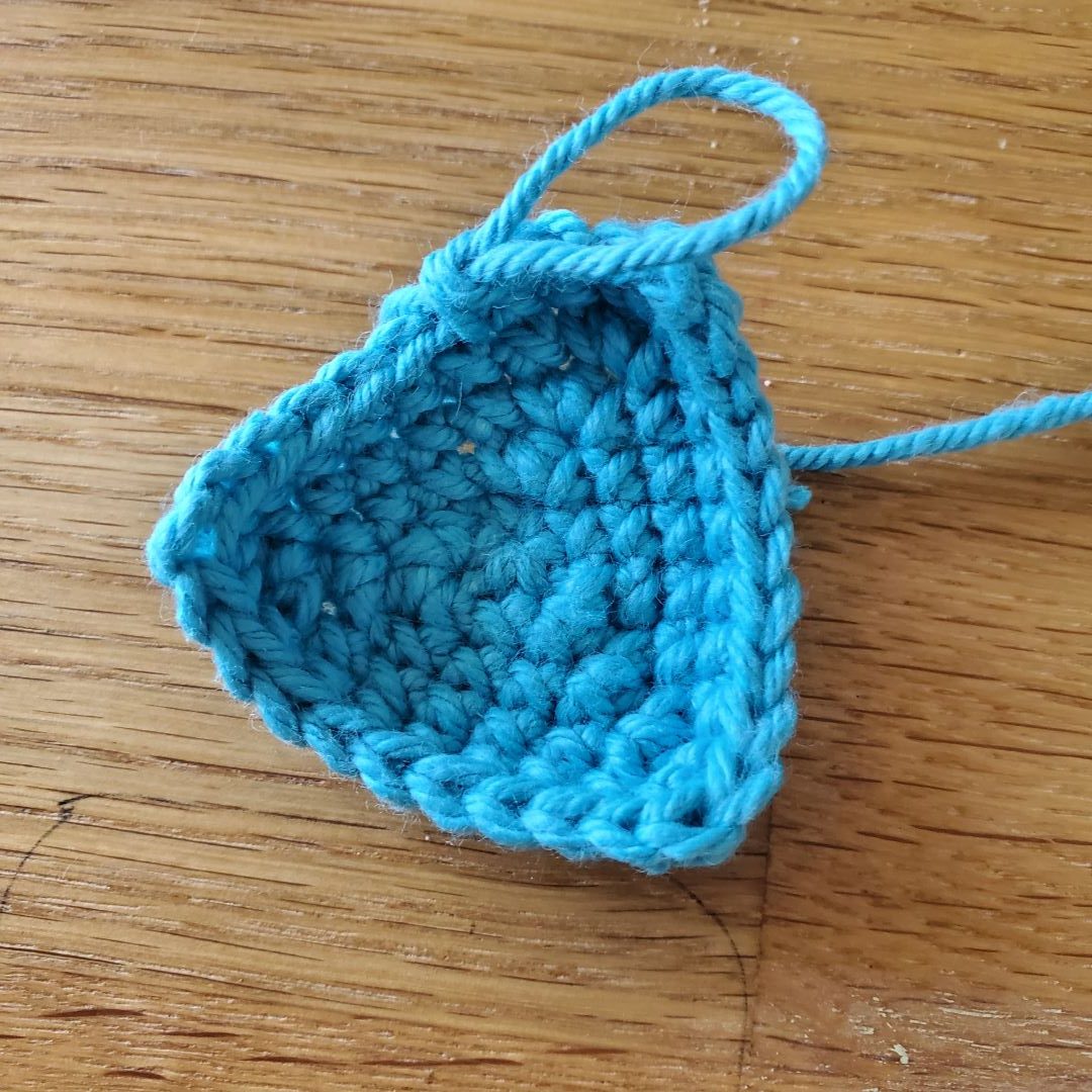 blue crochet triangle